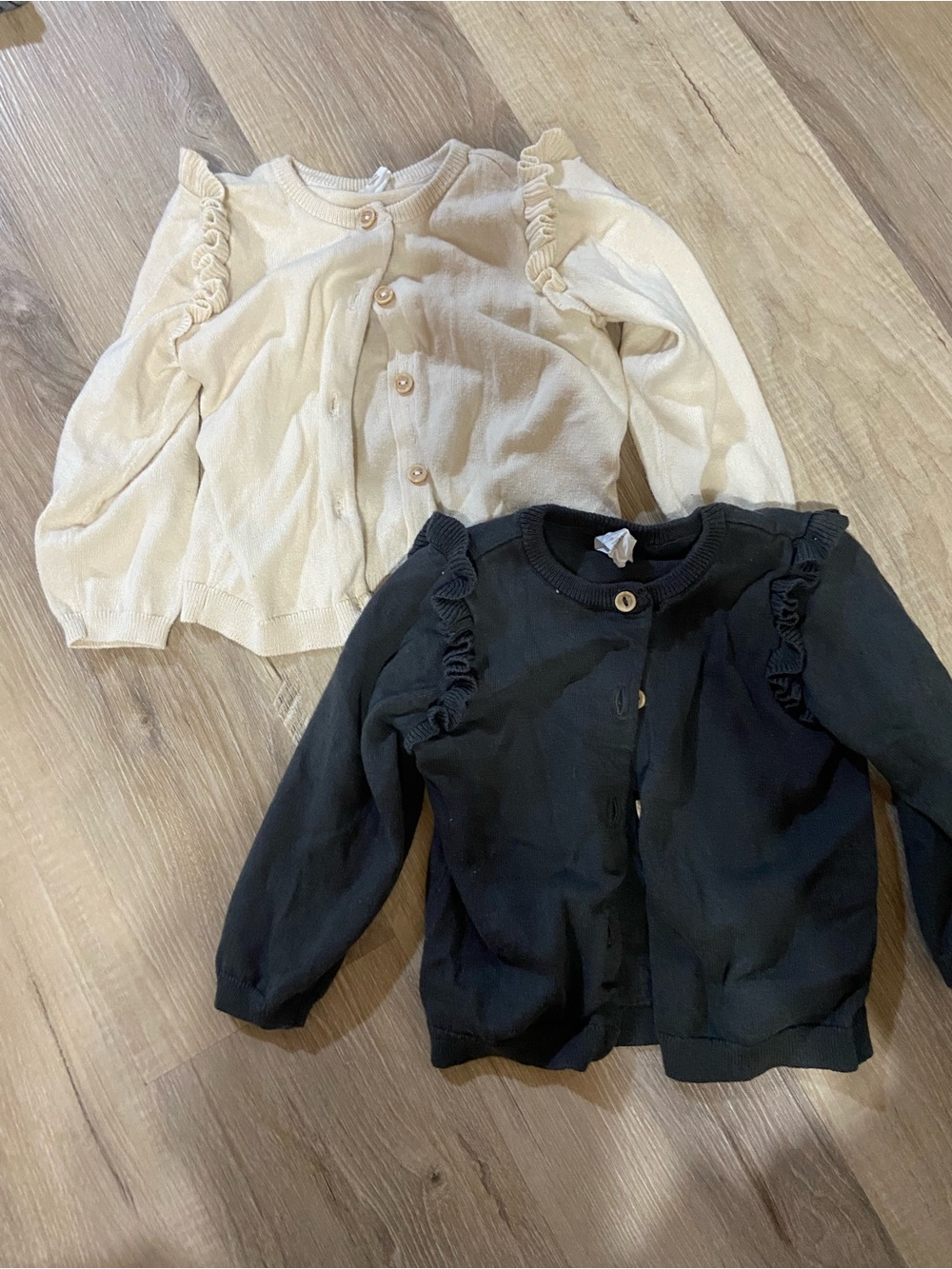 H&M Ruffle Shoulder Cardigans in Cream and Black
